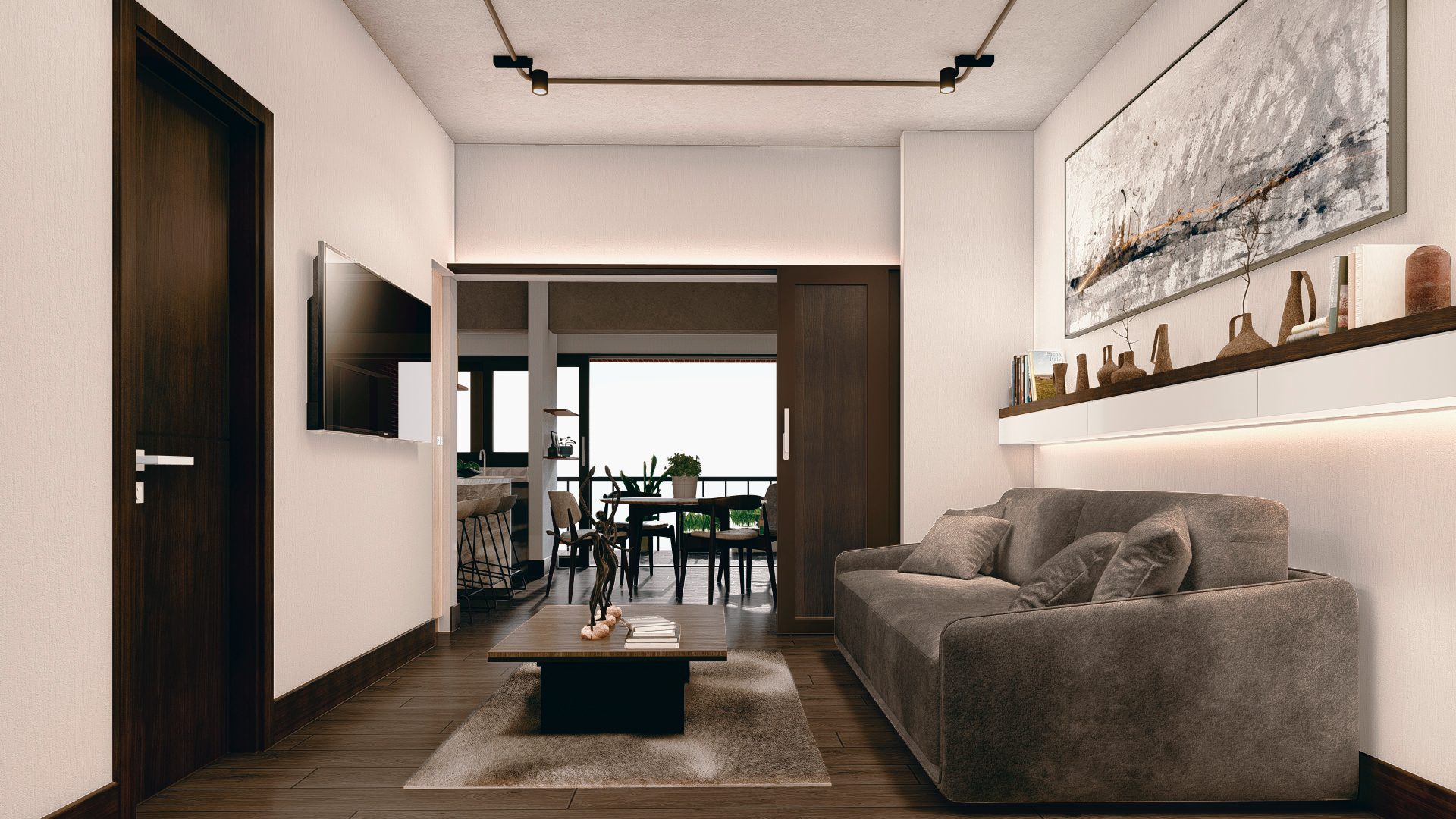Sala flexible del apartamento InHaus con sofá y comedor al fondo